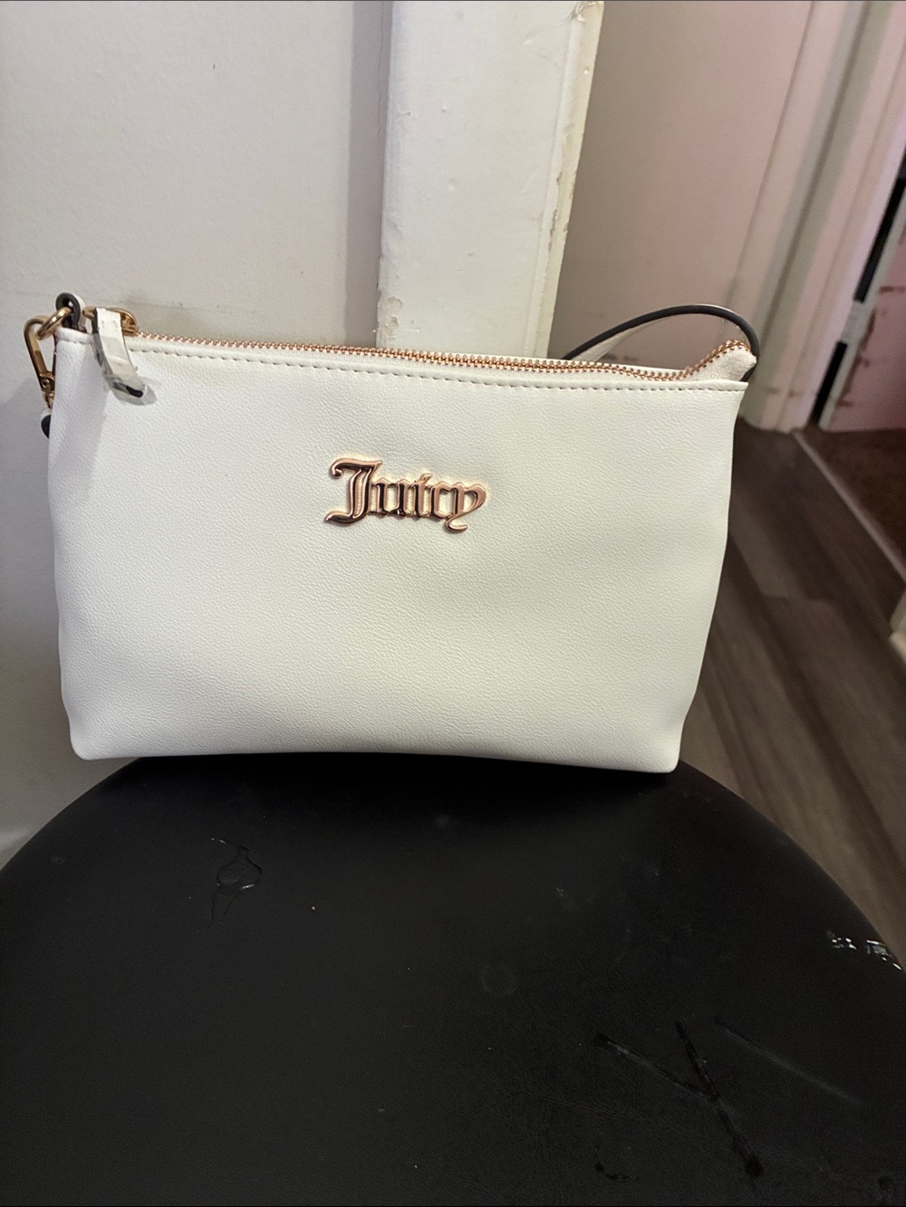 Juicy Couture White Wristlet with Rose Gold Logo